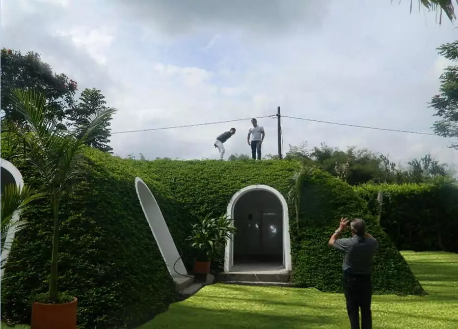 When soil is added to a prefabricated Green Magic Home, its weight reportedly actually helps press the sections together, adding strength instead of creating structural stress