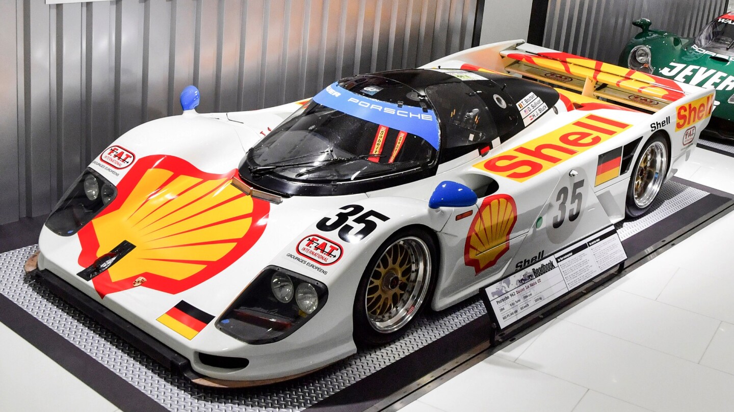 The Dauer 962 Le Mans was a limited-production sports car built from 1993 to 1997 and based on the Porsche 962 racing car, that just like the Ferrari 250 GTO, was built to circumnavigate racing regulations. Built by German Jochen Dauer's Dauer Racing, a racing version of this car went on to win the 1994 24 Hours of Le Mans with the support of Porsche. The bodywork of the road car was replaced with slightly revised carbon fibre and kevlar panels, the under tray was replaced with a flat version for better stability at high speeds, a second seat was installed in the cramped cockpit, and a modified version of Porsche's water-cooled Type-935 2994 cc twin-turbocharged flat-6 produced 730 hp (544 kW) - more power than the regs allowed the real car upon which it was modelled. The first production car debuted at the 1993 Frankfurt Auto Show and after the Le Mans win the following year, at least twelve more examples were built. The car's top speed of 404.6 km/h (251.4 mph) was independently measured, causing Evo magazine to proclaim it the 'fastest street-legal production car in the world.' That's the Le Mans winner pictured above in the Porsche Museum, where its claimed top speed on the placard shows as 365 km/h. Go figure!