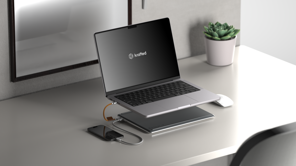 Slim power bank slides under a laptop for juice on the go