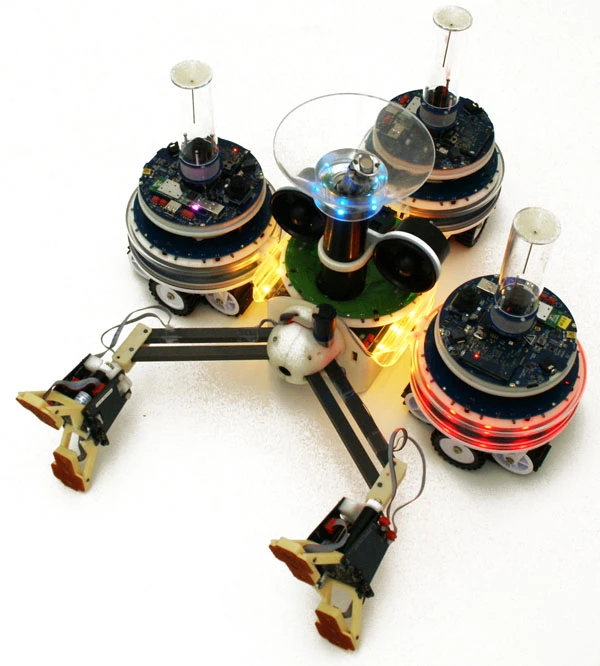 A Swarmanoid Hand-Bot, with three Foot-Bots