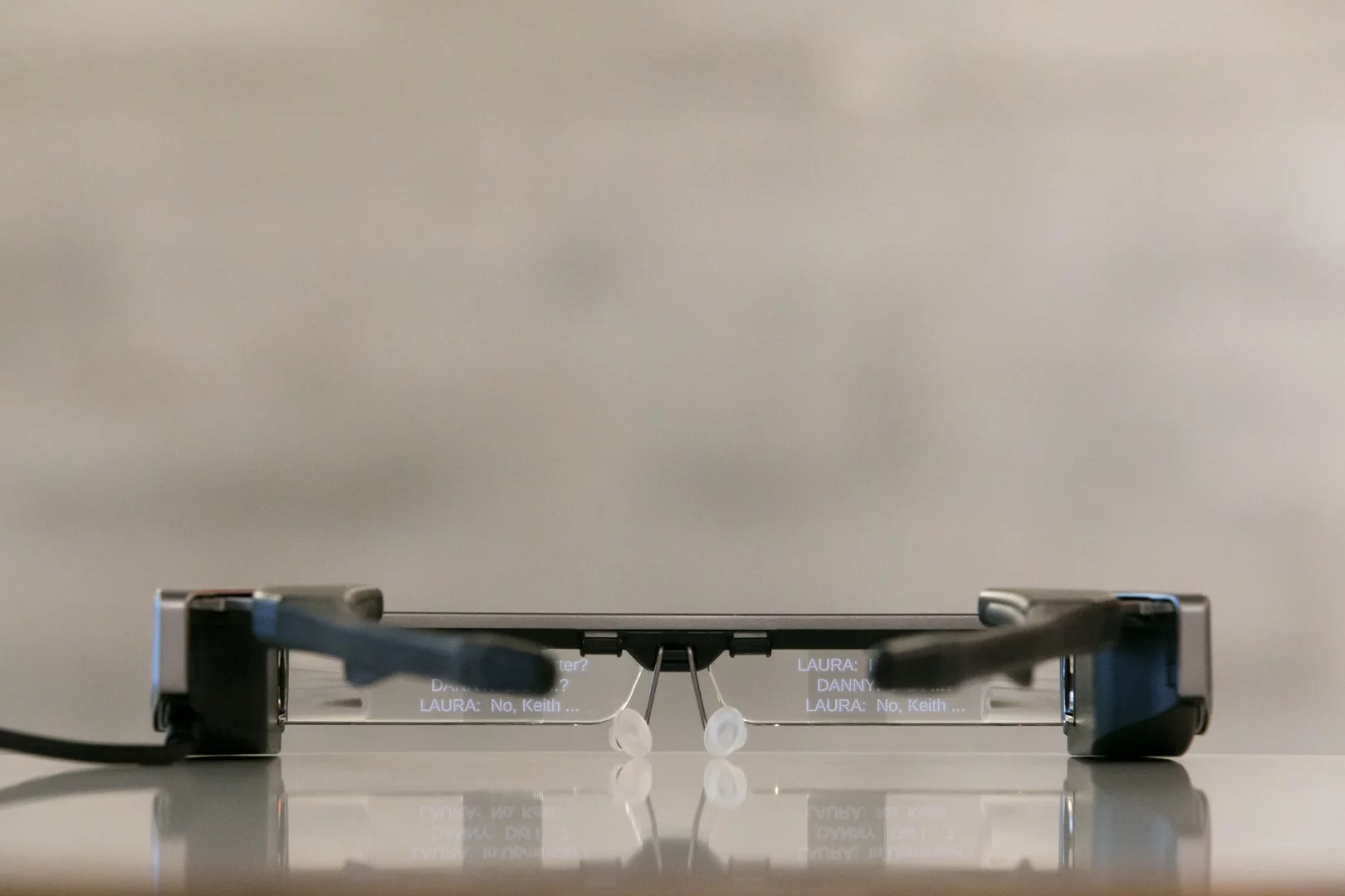 The wearer can adjust the typeface size, color and position to suit personal preferences