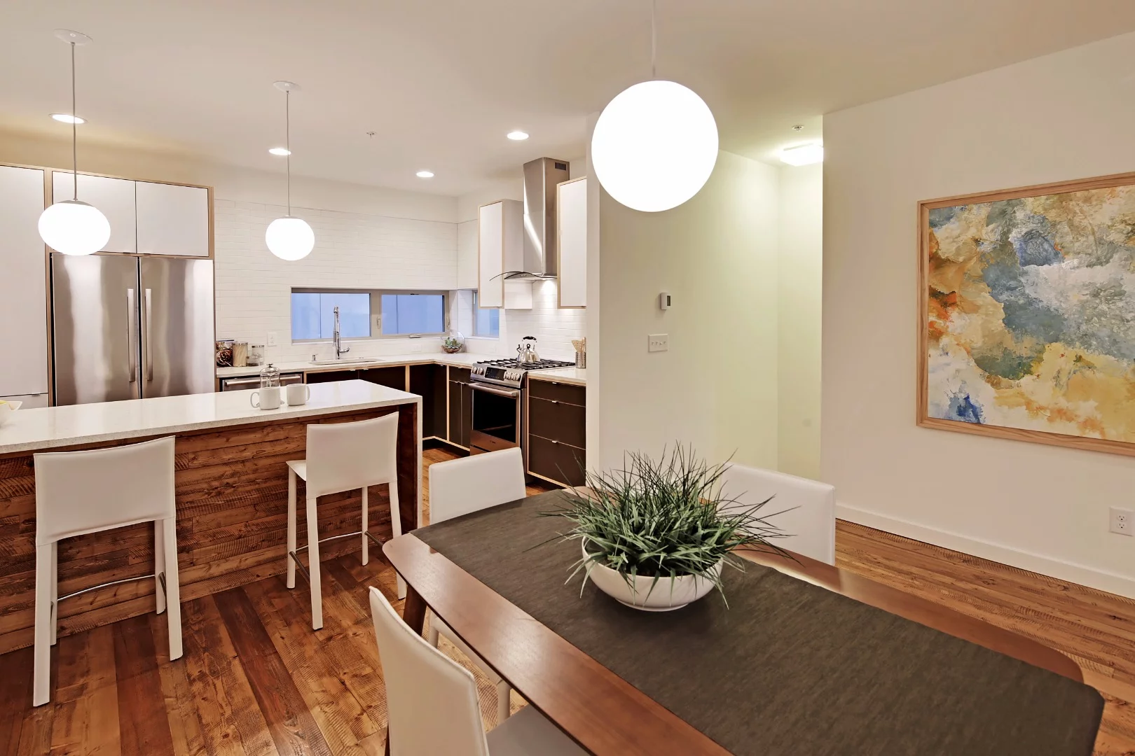 There are open-plan kitchen and living areas