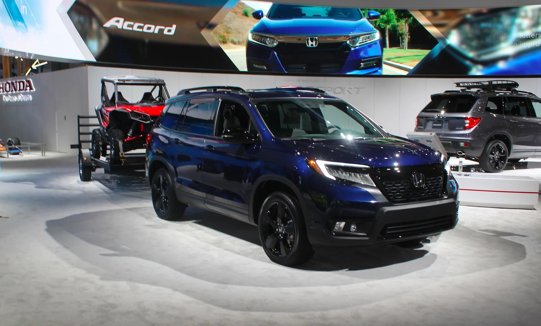 The new Honda Passport towing the equally new Talon 1000R at the 2018 LA Auto Show
