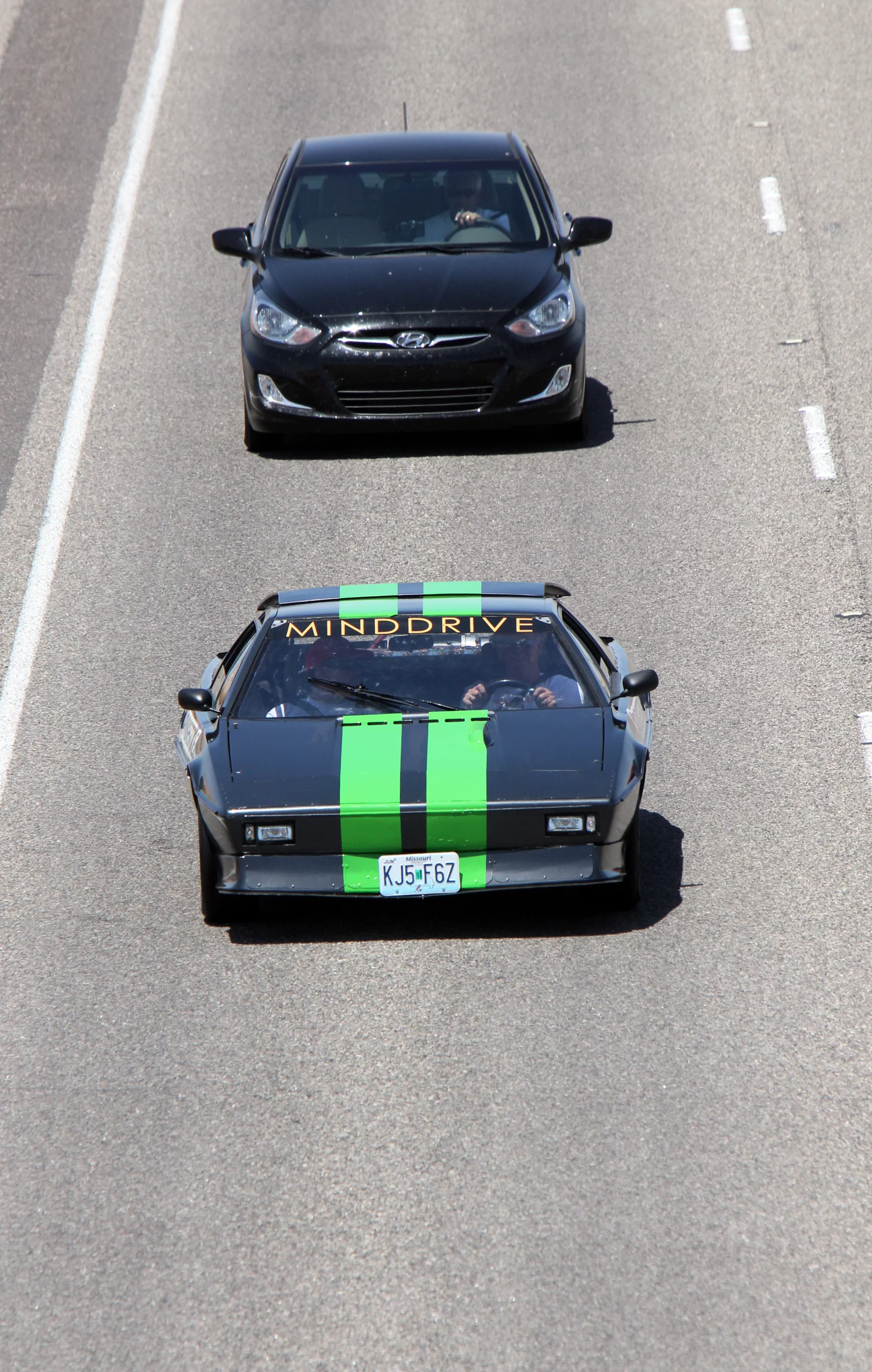 MINDDRIVE mentors and 15 at-risk students converted a 1977 Lotus Esprit to electric-only drive and then drove it coast-to-coast across America