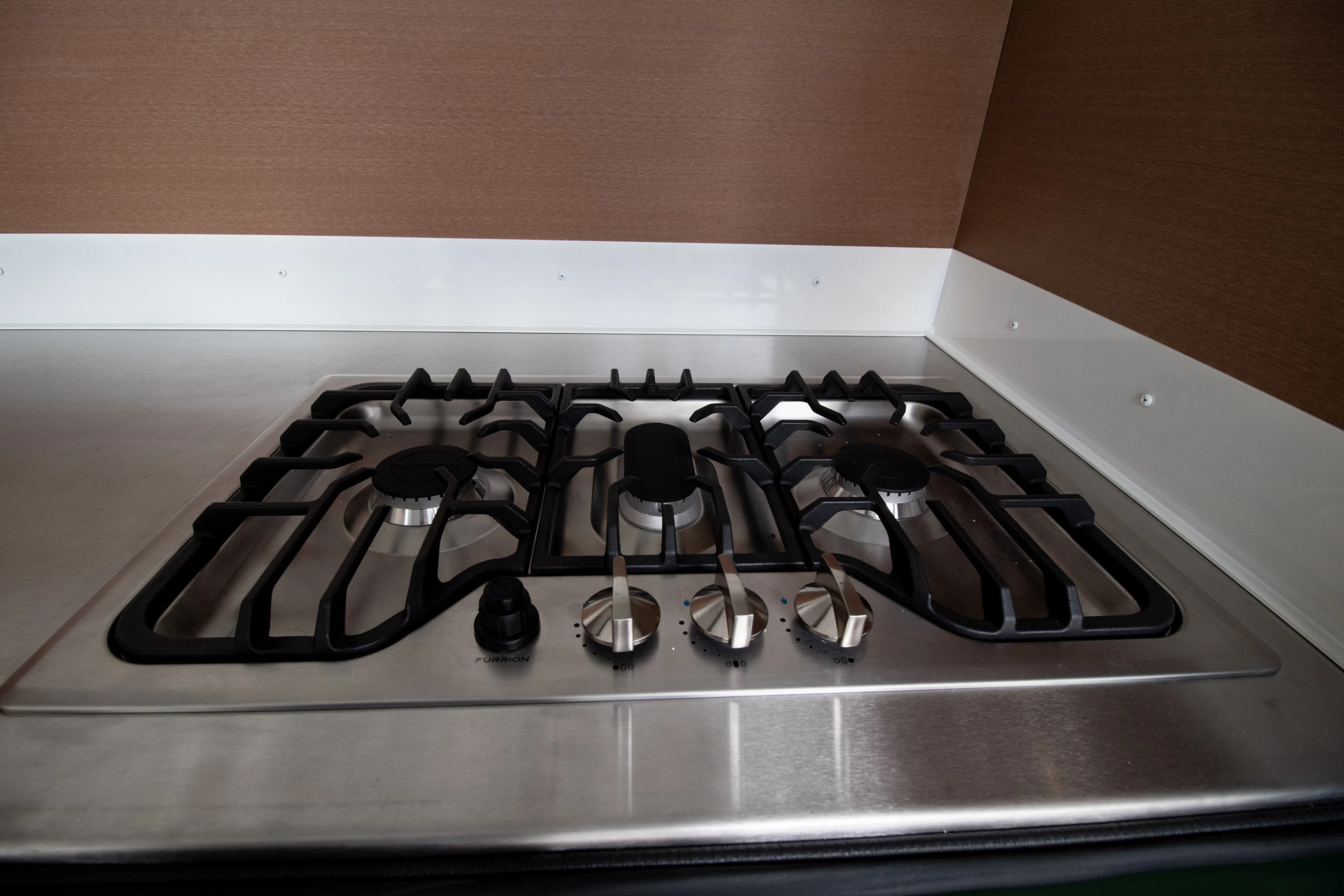 Camper trailers tend to have dual-burner stoves, but Sasquatch ups that to a three-burner