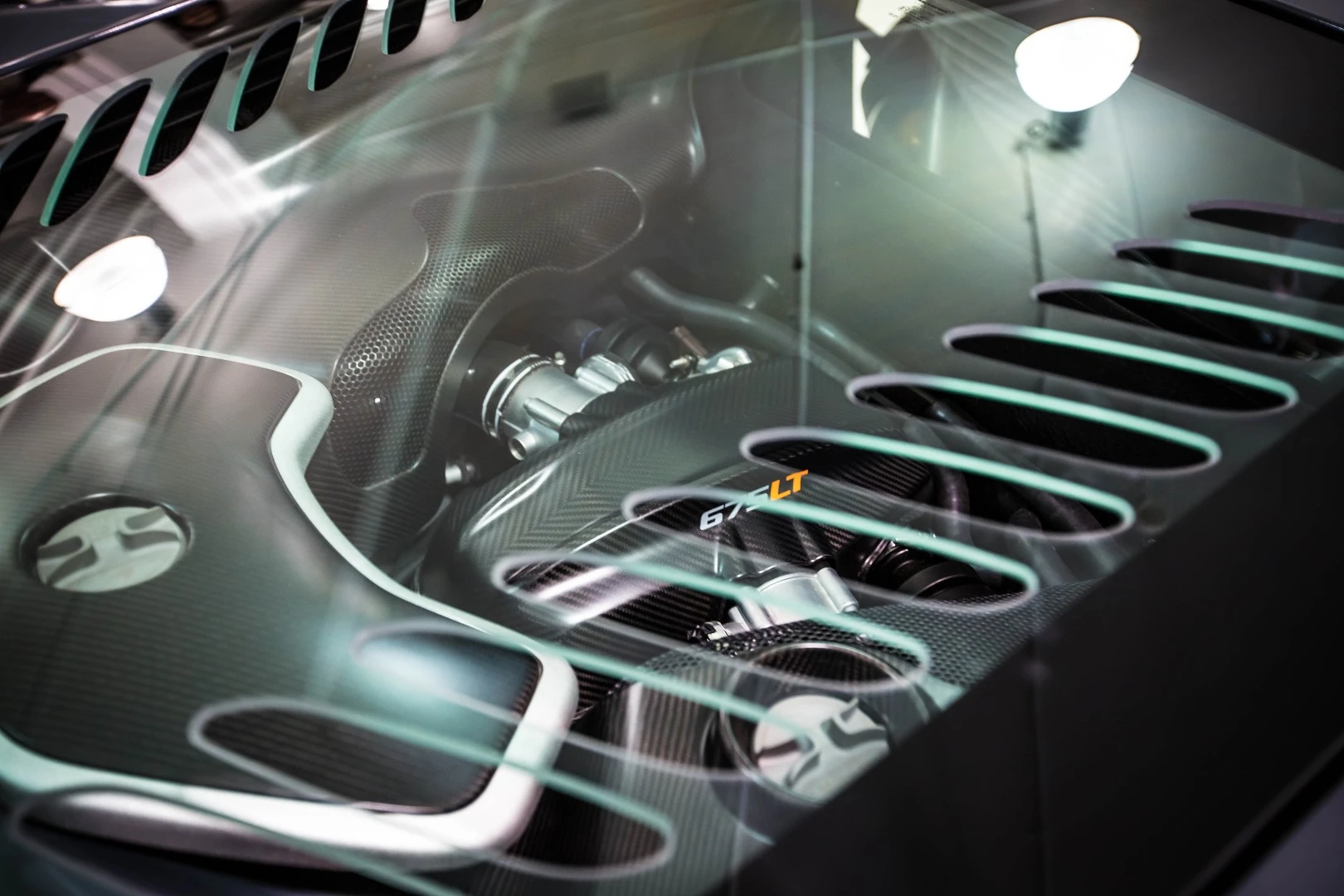 The perspex screen over the engine is so thin it bends when you touch it