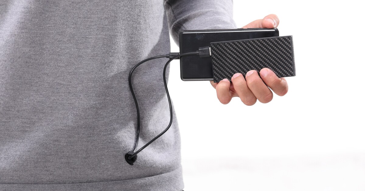 Ultralight Nitecore carbon fiber charger keeps trail runners charged