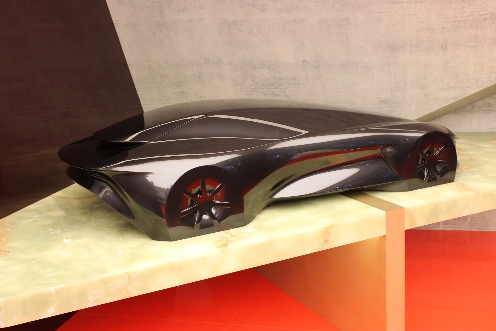 Aston also shows a coupe model in line with the Lagonda Vision design language