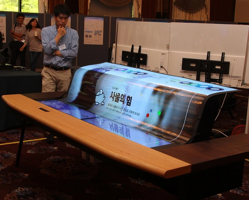A 77-inch flexible screen for your smart desk, sir?