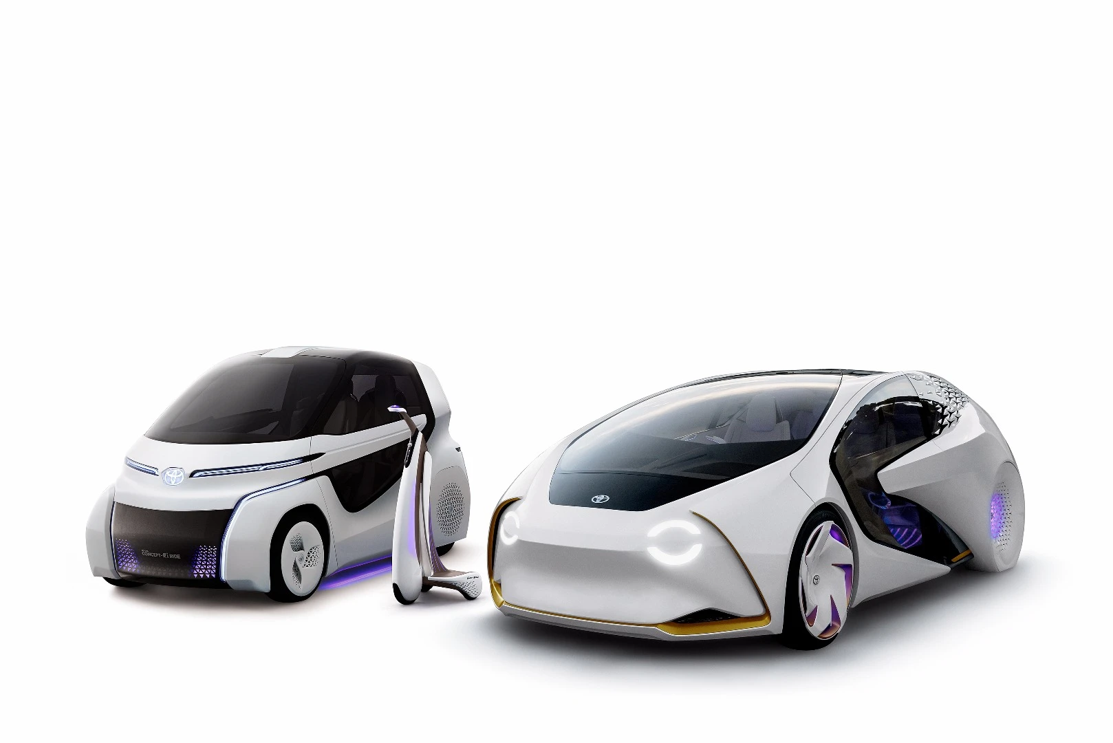 Toyota's Concept-i Ride alongside its original Concept-i vehicle