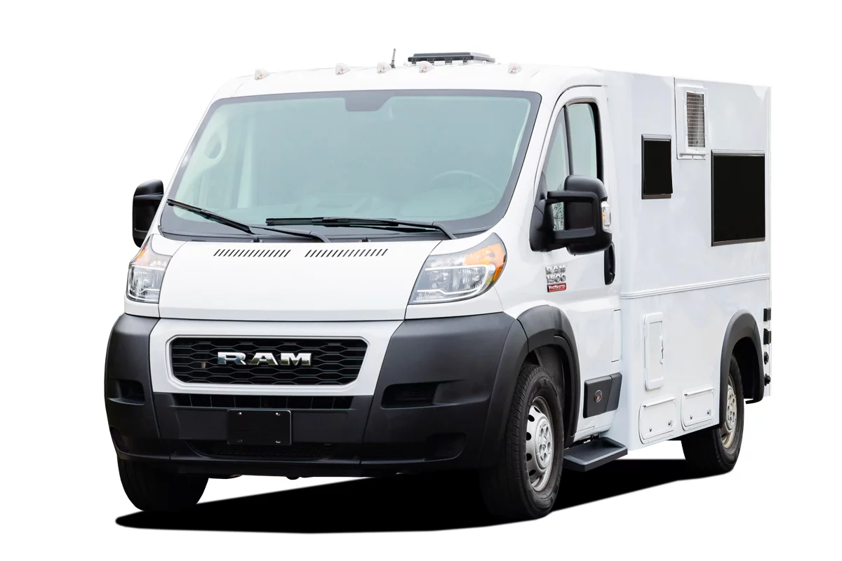 The Maxvan Access camper looks like a utility van from one side, a standard van or camper van from the other
