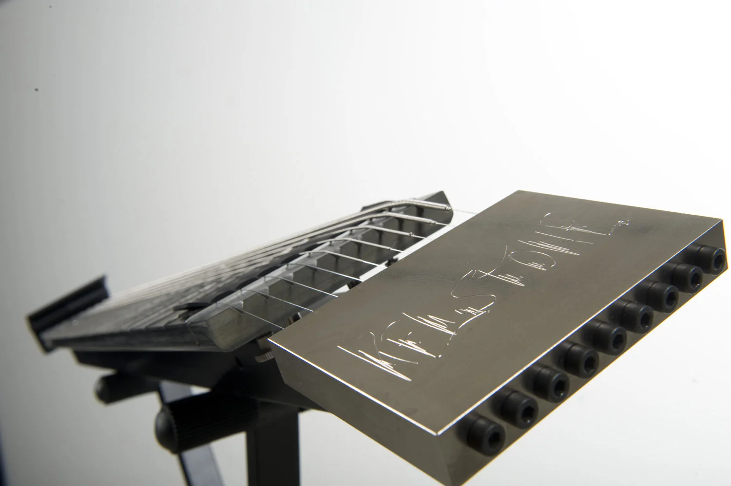 Kelstone weighs 18.29 pounds, is 42.5-inches long and has adjustable screws at the nut