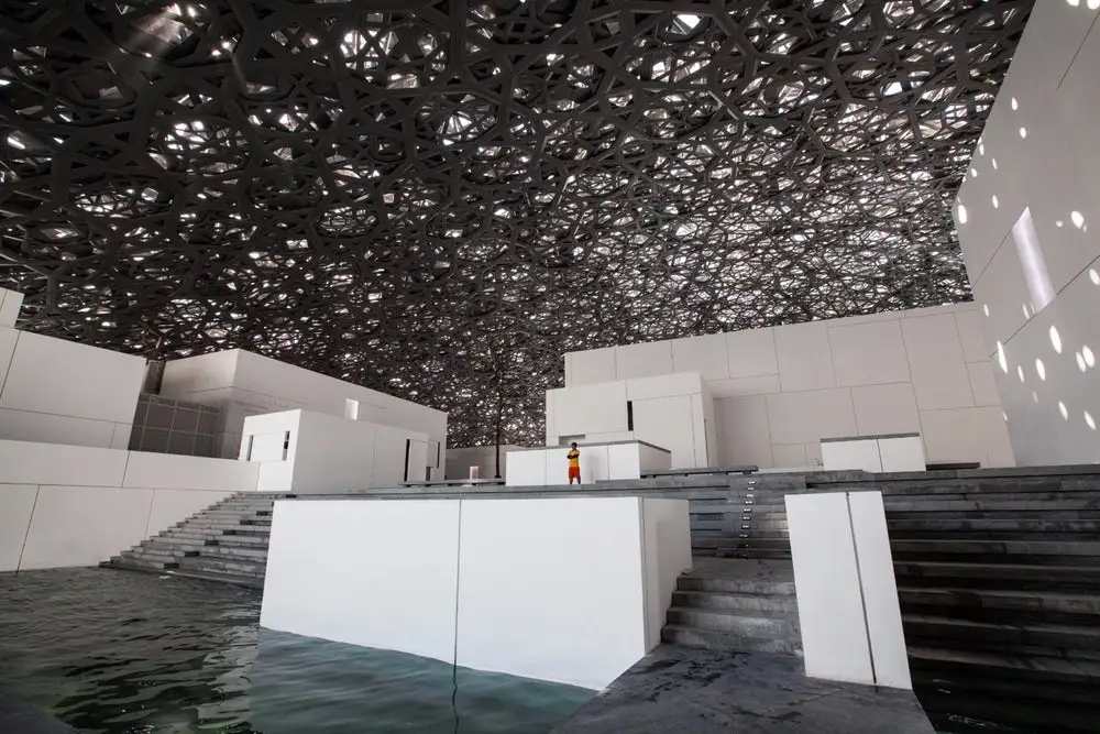 A lifeguard watches over the waters of the Louvre Abu Dhabi