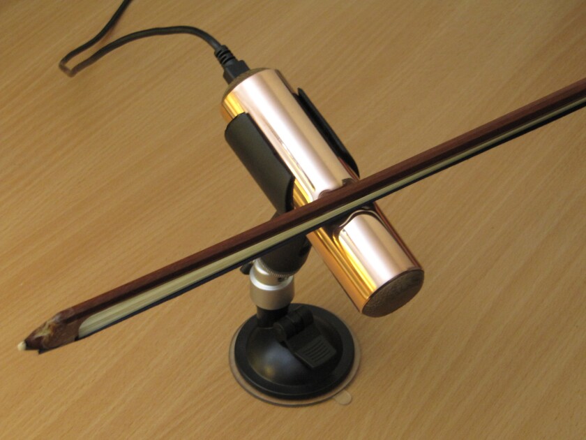 In addition to tracking horizontal movement, the high resolution sensor is able to approximately measure the distance of the bow above the saddle-shaped guide