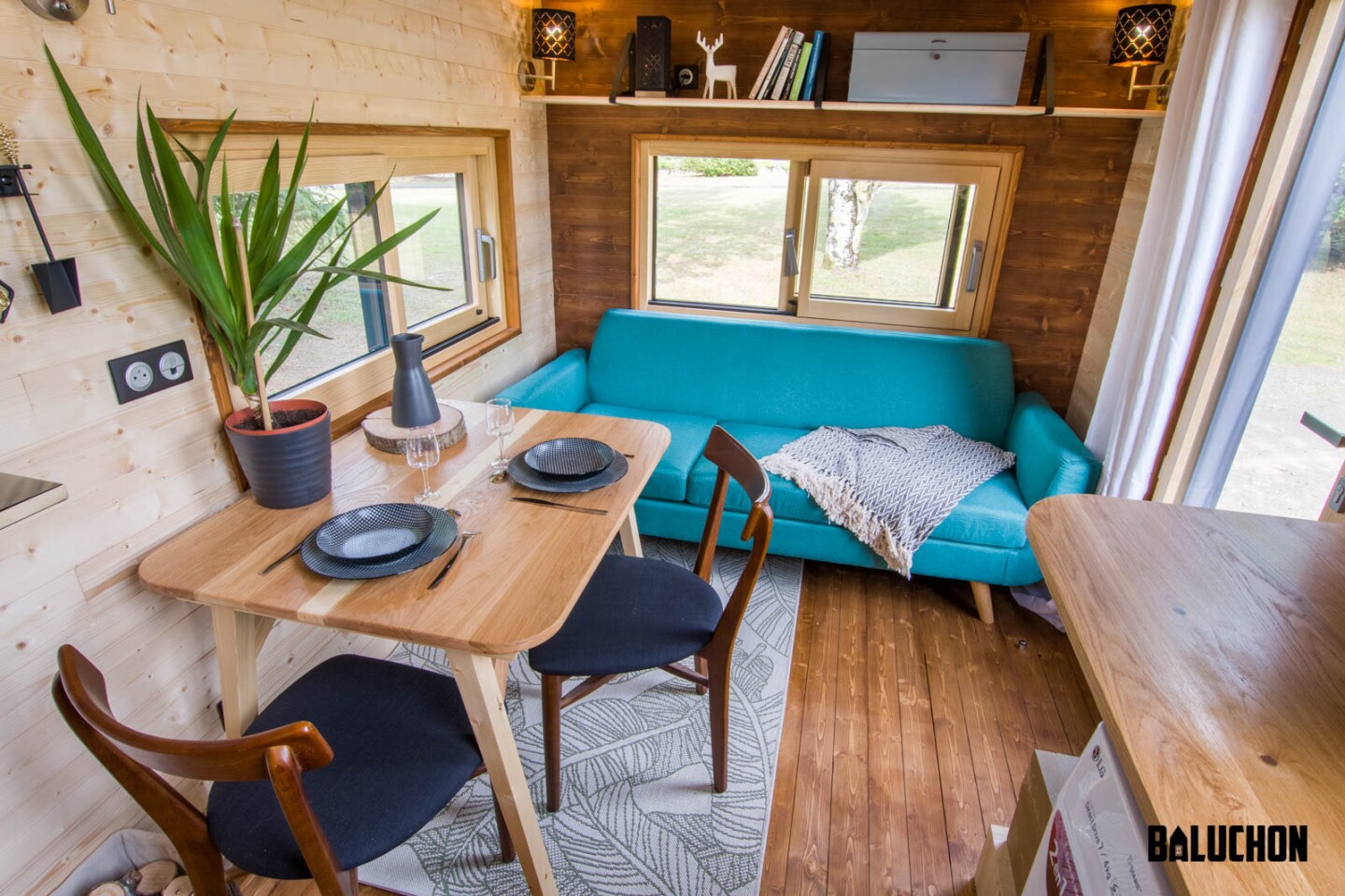 Visitors enter the Astrild Tiny House into the living room
