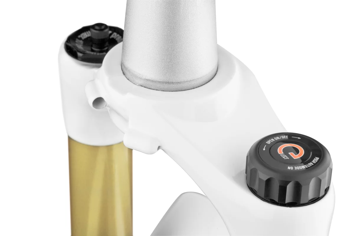 The Magura eLECT module (lower right) replaces the existing adjustment cap on an existing compatible fork