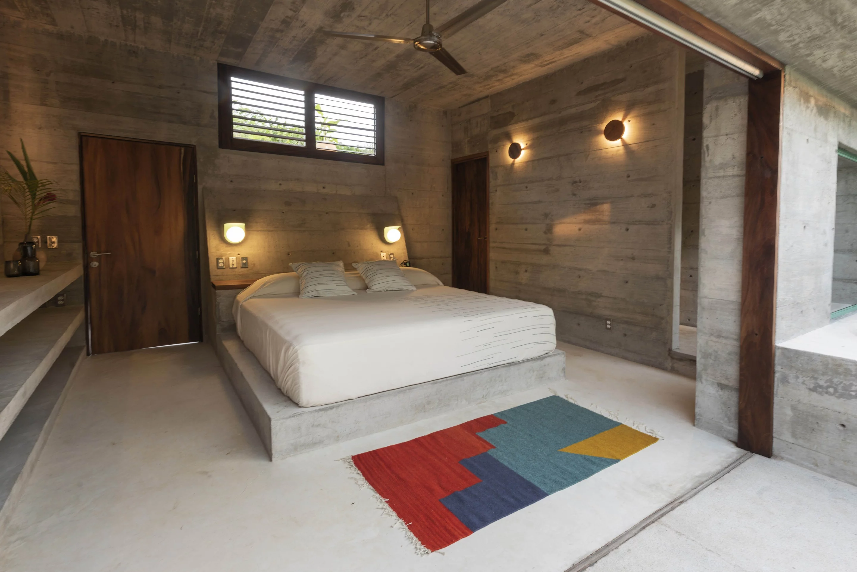 Concrete was chosen primarily to keep the interior spaces cooler, while protecting the structure from the outdoor heat