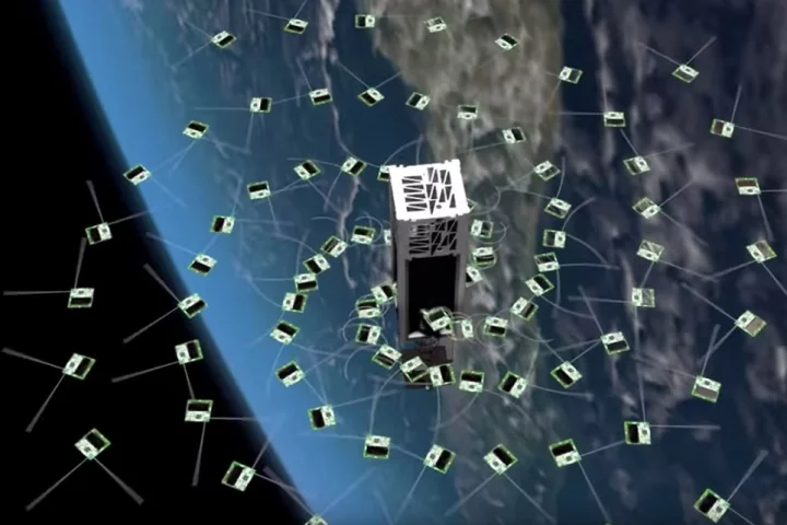 An artist’s rendering of the deployment of ChipSats from a shoebox-sized CubeSat