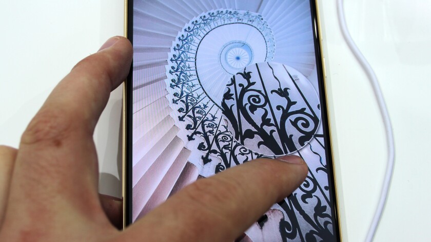 You can use the Force Touch to zoom in on photos in the phone's galler