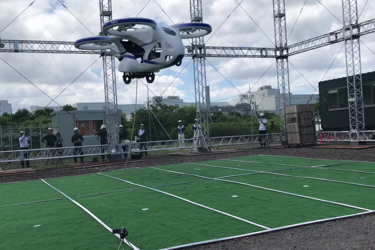 NEC's flying car prototype in caged testing