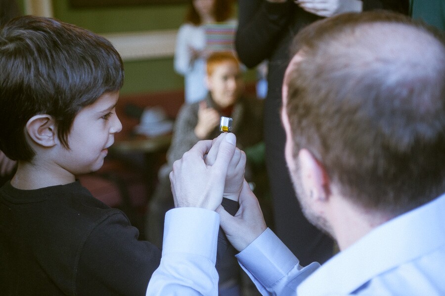 Babitz showing a child what the sensor can do