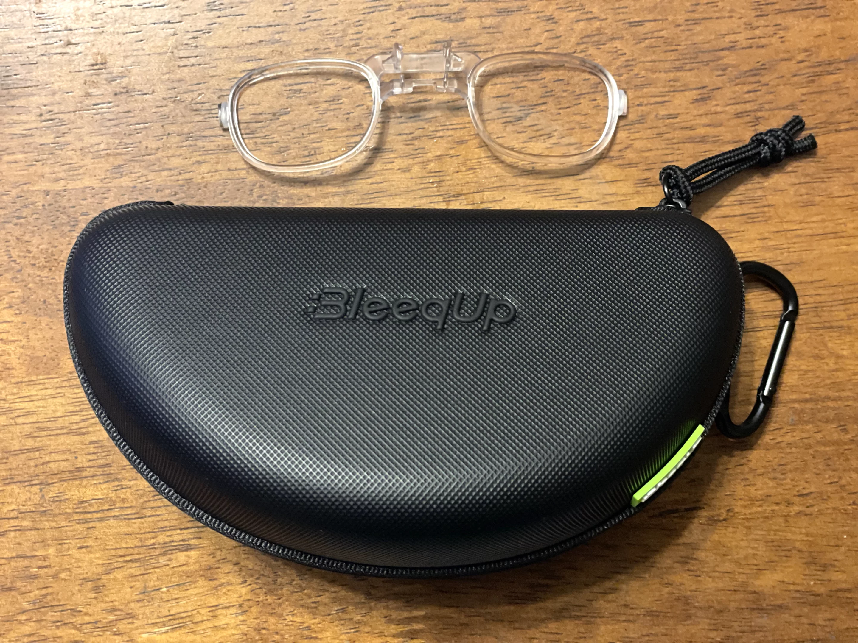 The tough sports case also comes with a clip to attach the glasses to your gear – and a clip-on accessory for prescription lenses