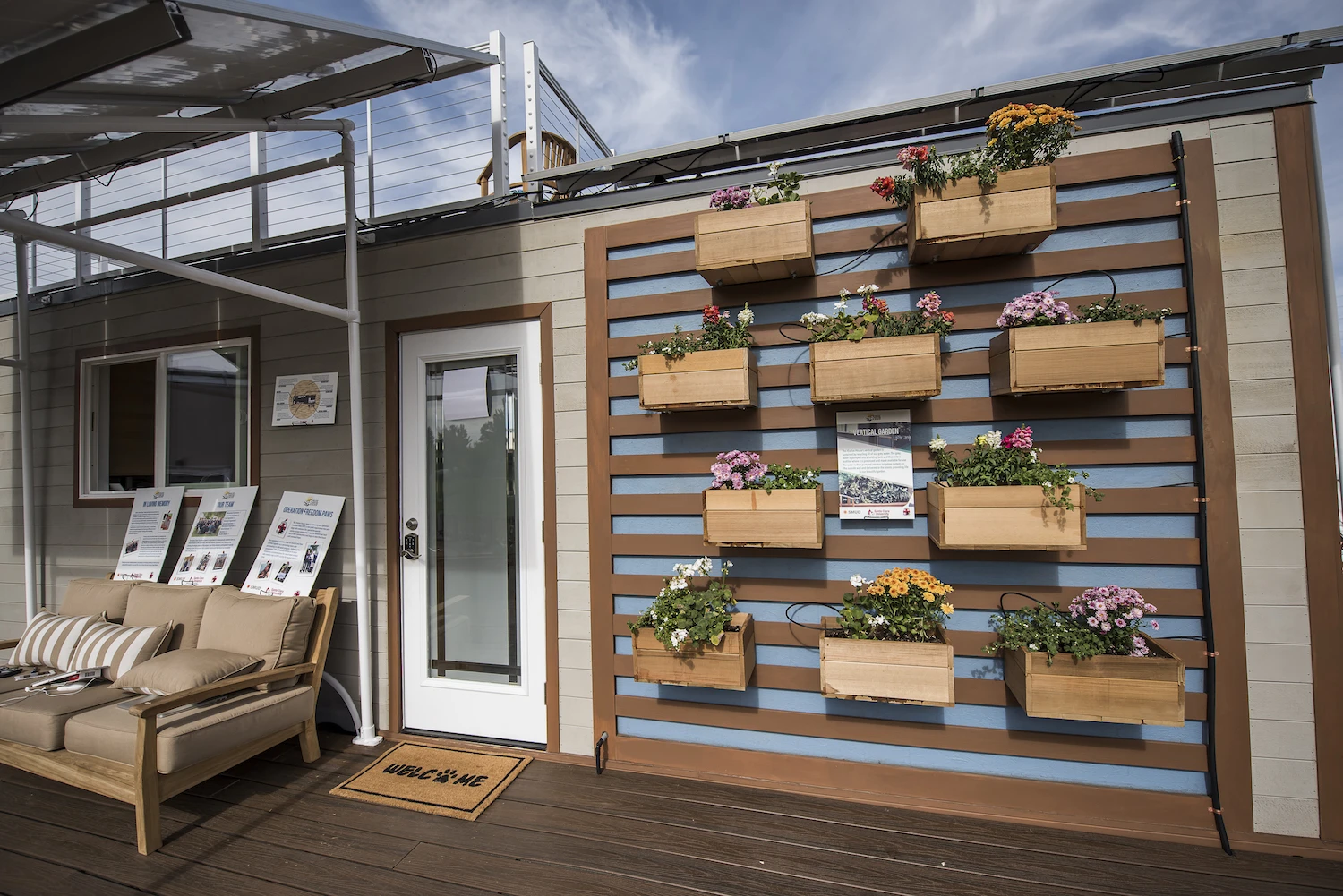 The Revolve House is constructed from SIPs and features a "green wall" made up of small planters