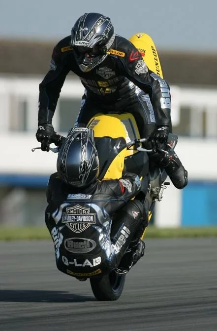 Craig Jones (riding) and Wing Chui (front wheel) breaking the world record at Donington.