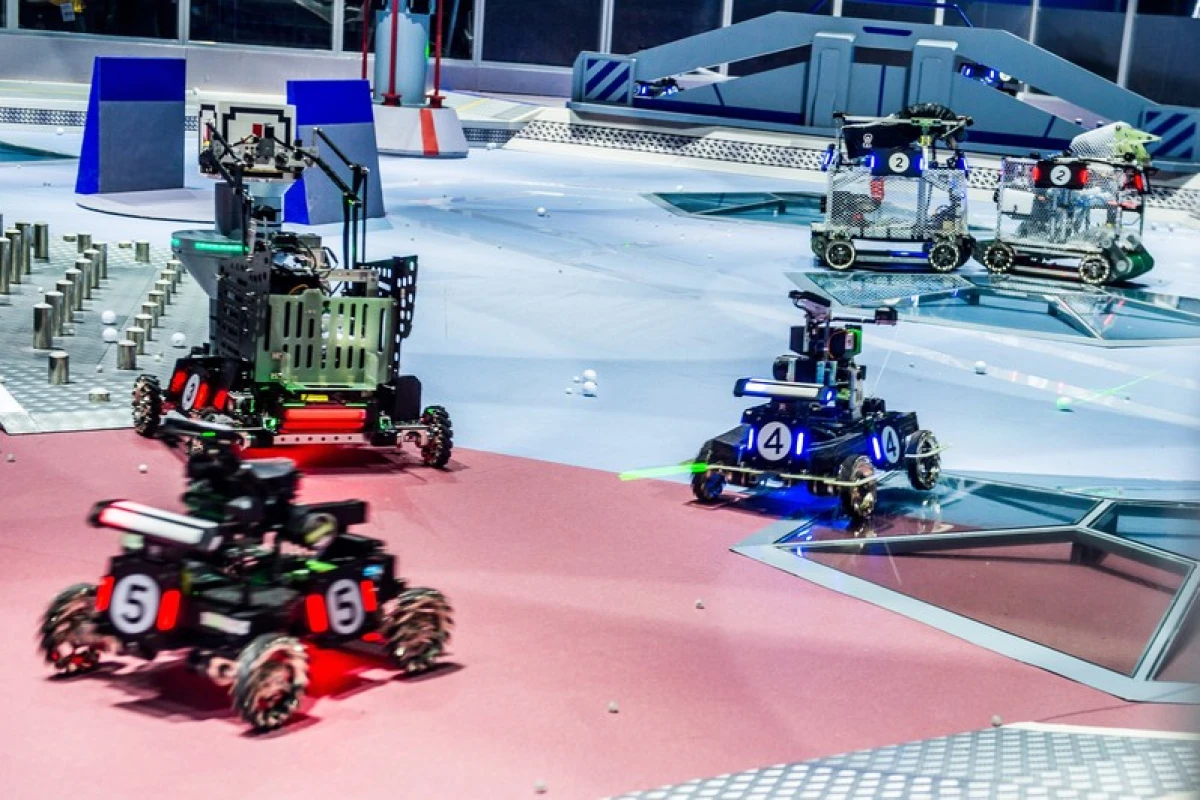The object of a RoboMaster battle is to take out an enemy base using five types of robot, including battle bots, drones and an armed base station