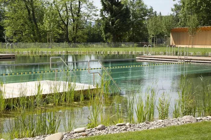 Features include a wading pool for toddlers, a separate pool with a sloping gravel beach, a water-slide, a 25-meter lap pool and a diving board (Photo: Helen Schneider)