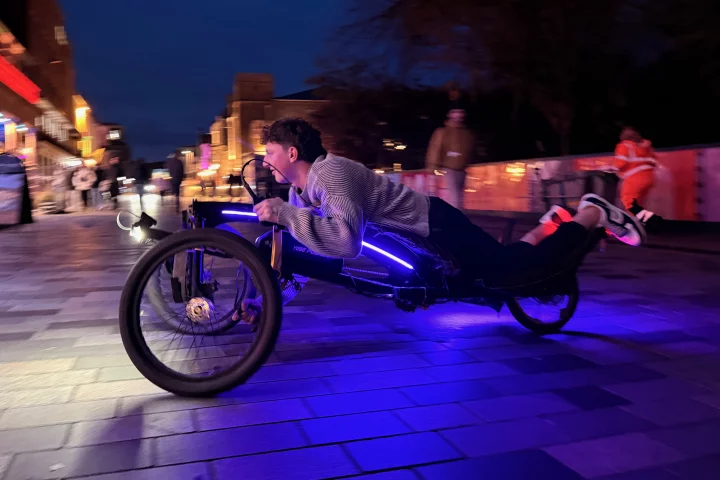 The Road-Legal model of the Swerv trike is actually a pedal-electric, although the other two models are throttle-only (and yes, a helmet would be a good idea)