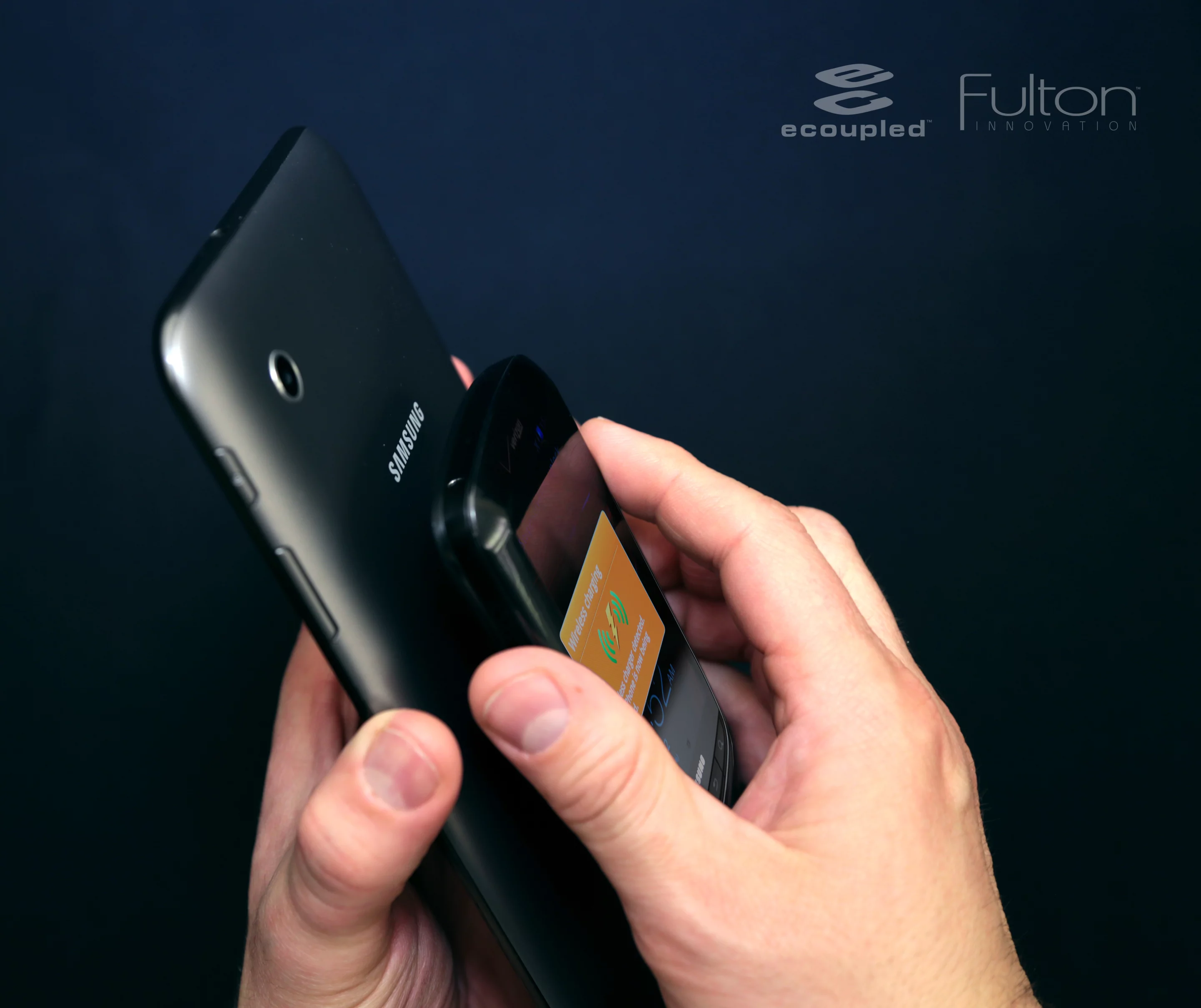 The Samsung tablet receives a wireless battery top-up, while also simultaneously charging a Qi-enabled mobile phone placed on its back