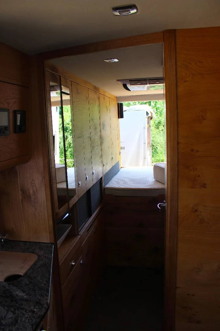 A look down the hall of the expanding Huenerkopf Sprinter SLO camper van