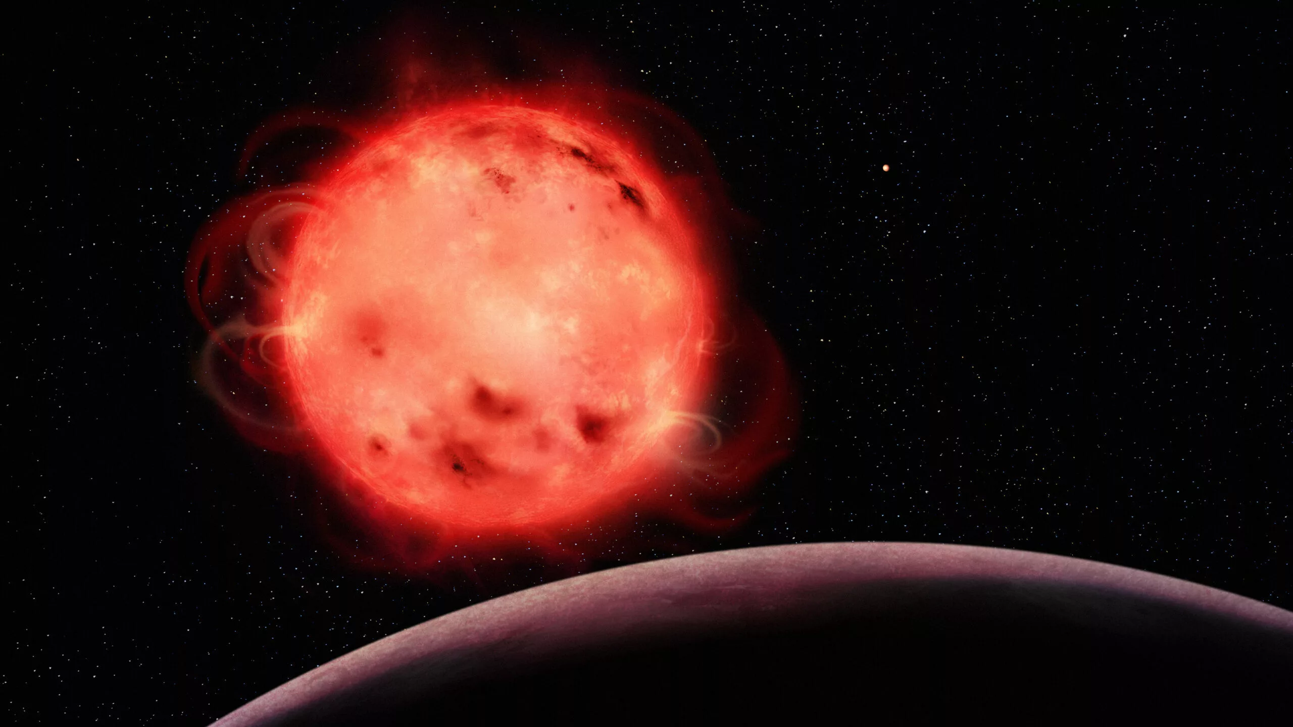 An artist's impression of the TRAPPIST-1 system, with the namesake star in the center and the innermost planet, TRAPPIST-1 b, visible in the foreground