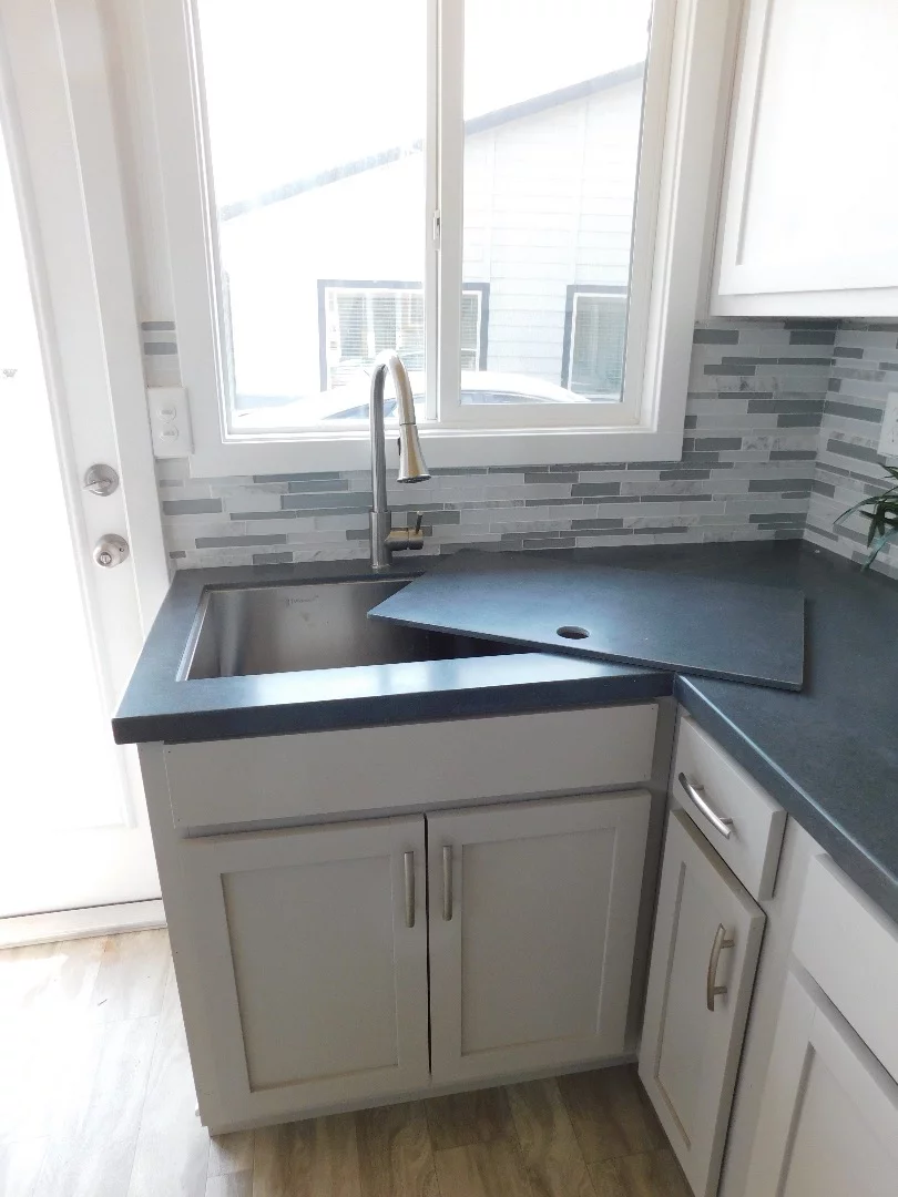 The Ozark's kitchen sink can be turned into extra counter space with a removable section