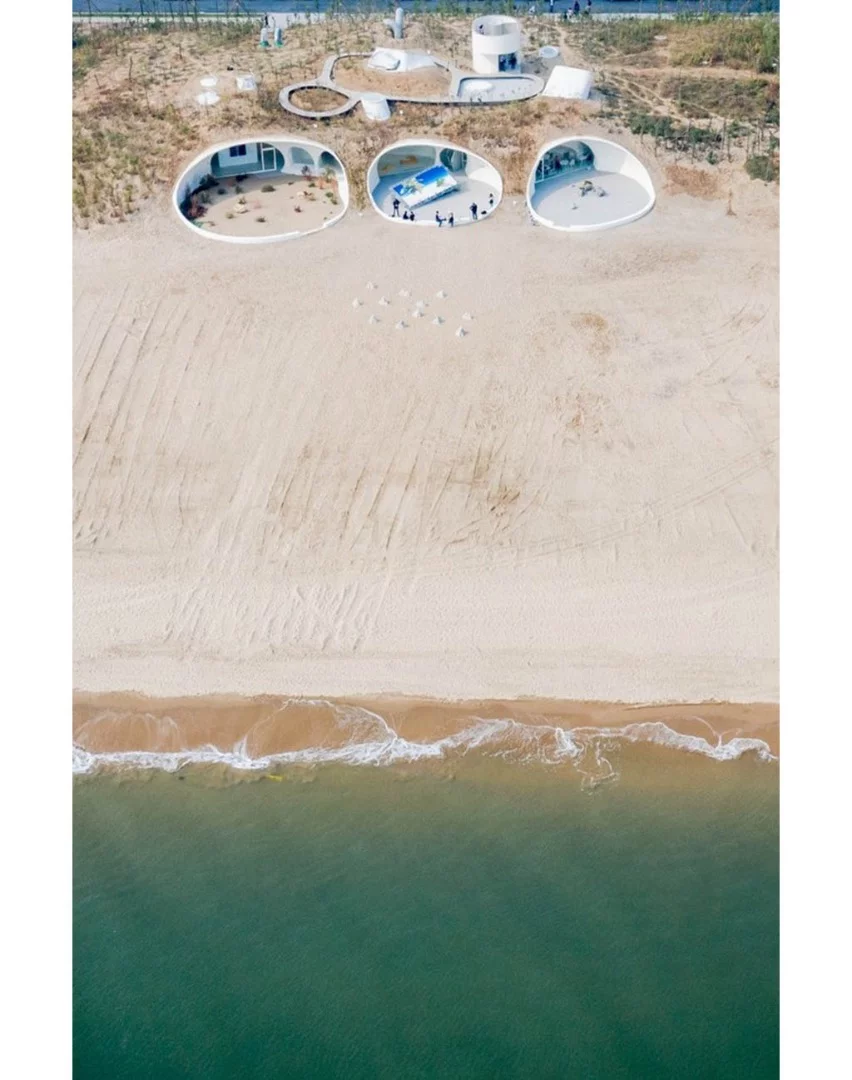 The UCCA Dune Art Museum consists of a complex concrete shell that was largely handmade by locals