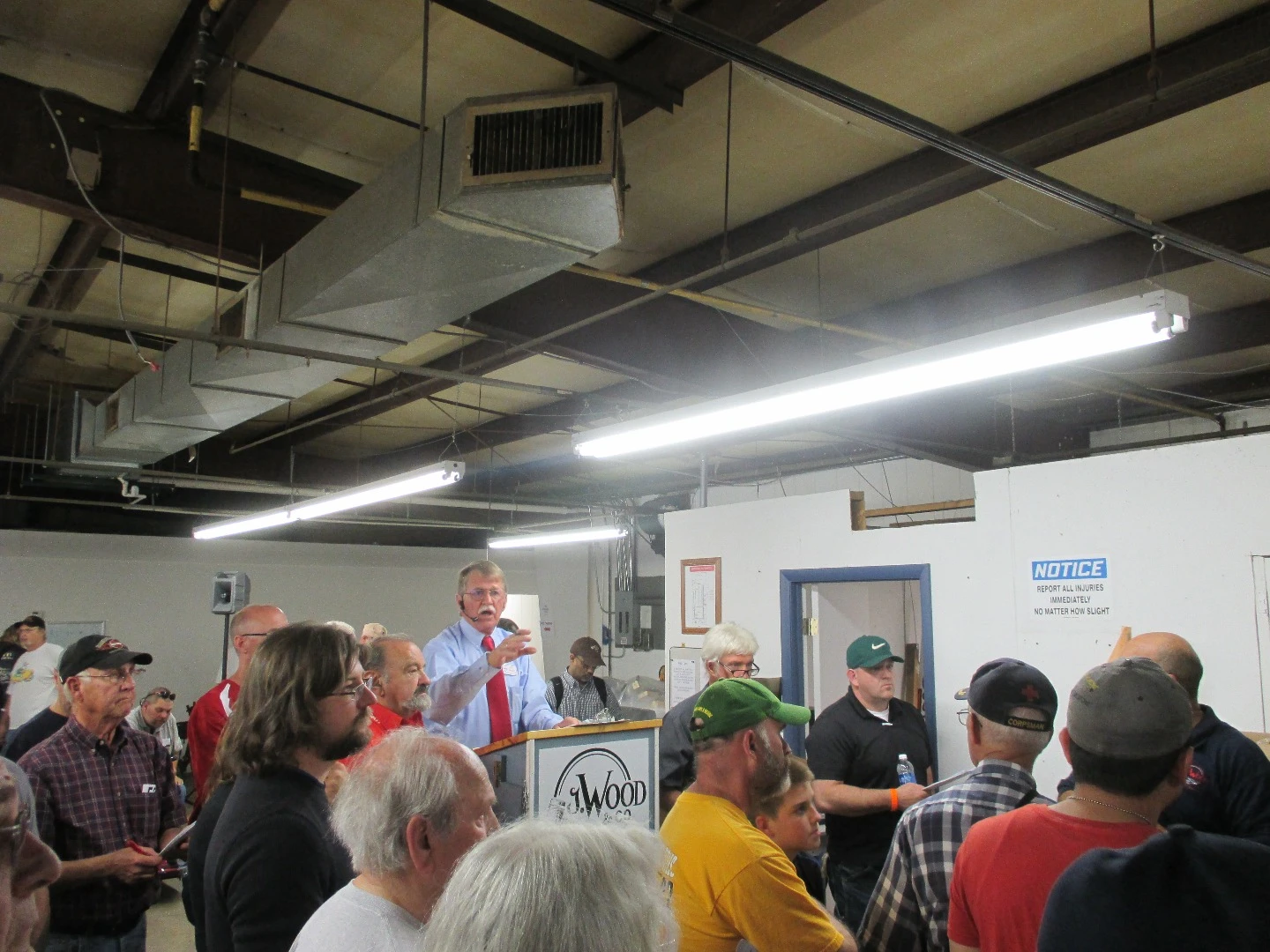 Auctioneer Jerry Wood goes over the ground rules for the sale