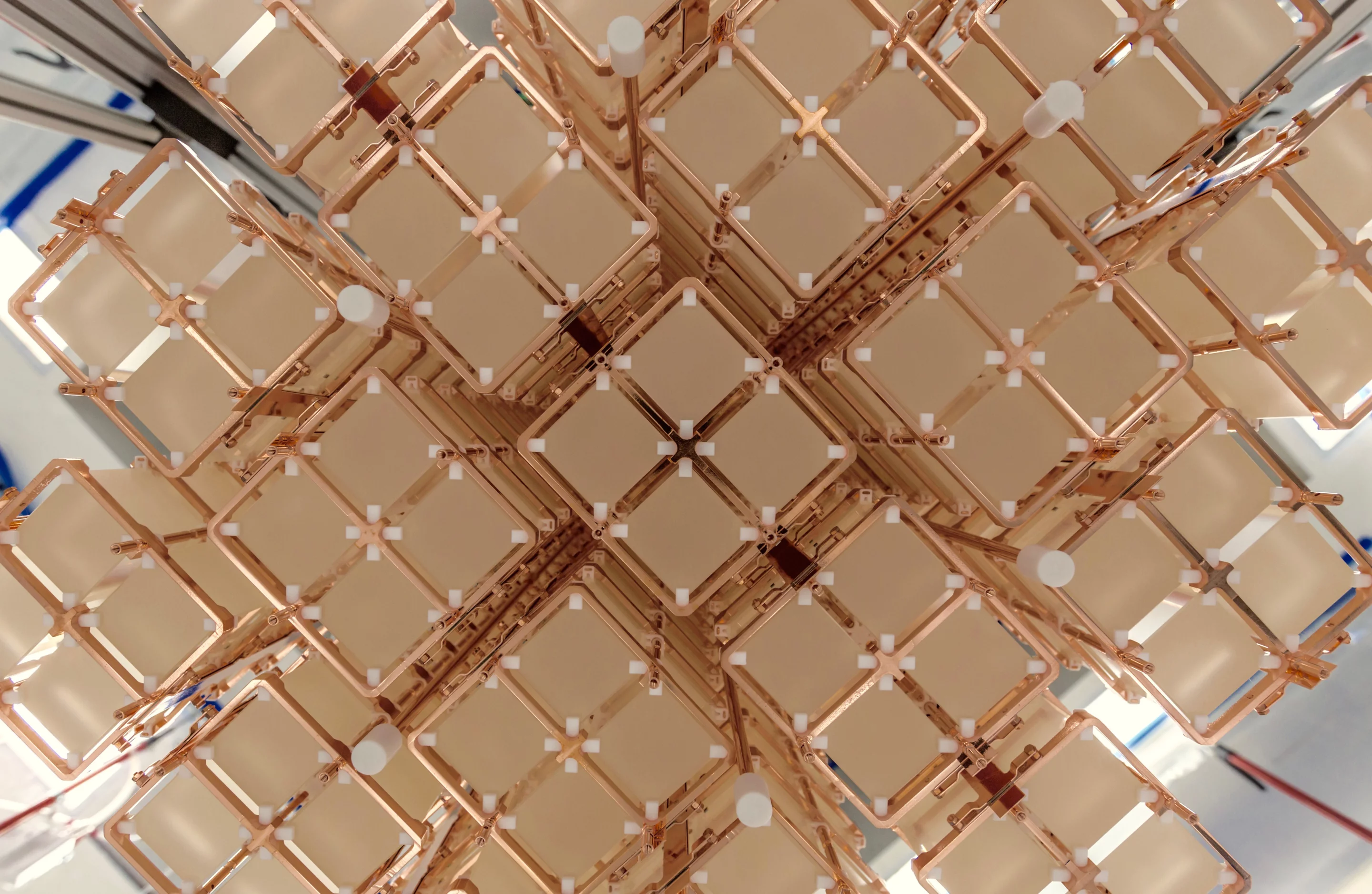 Bottom view of the 19 CUORE towers installed in the cryostat designed to help explain why the universe is made mostly of matter