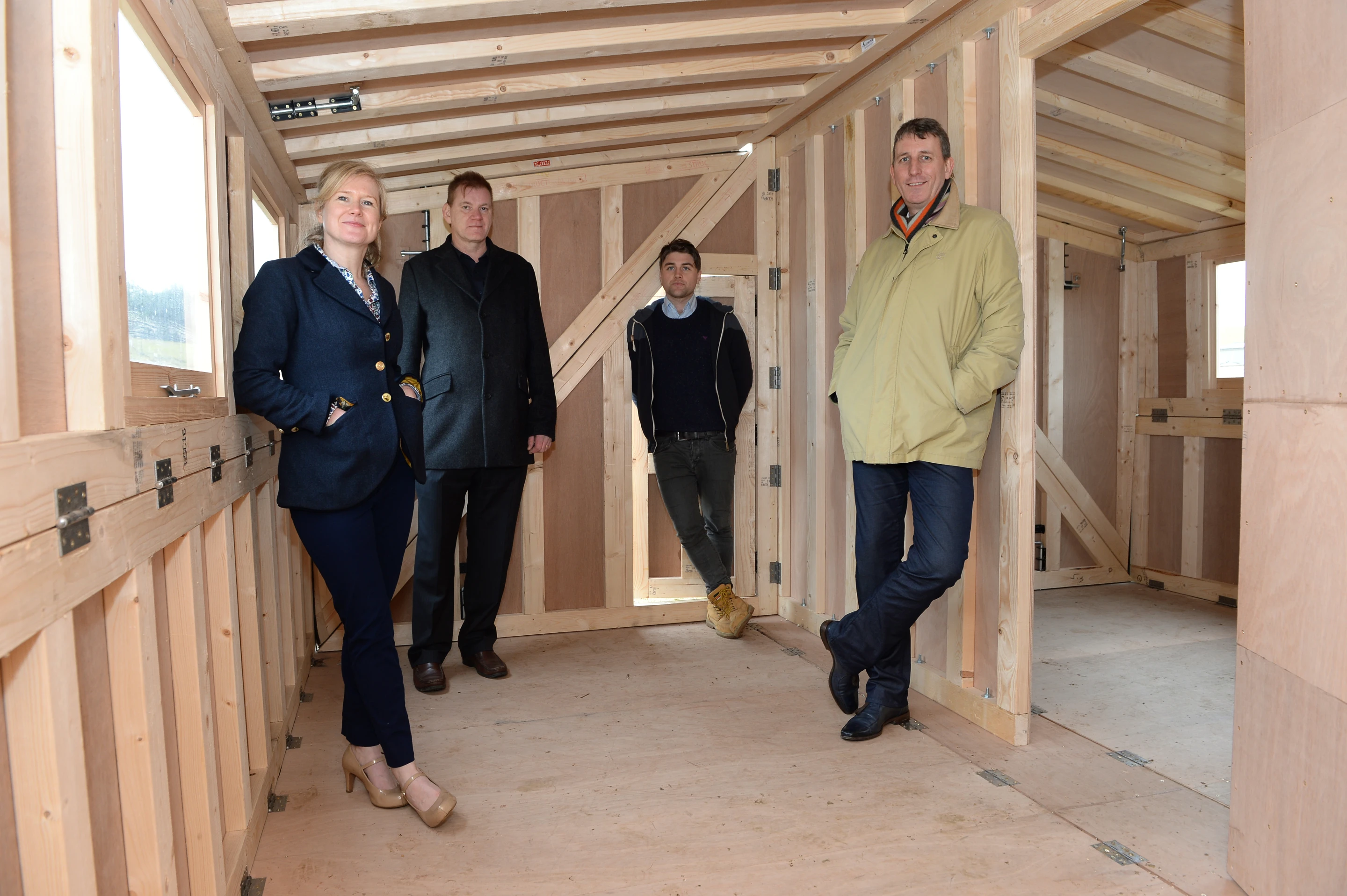 The Hush2 team stand in one of the two rooms into which the shelter is split