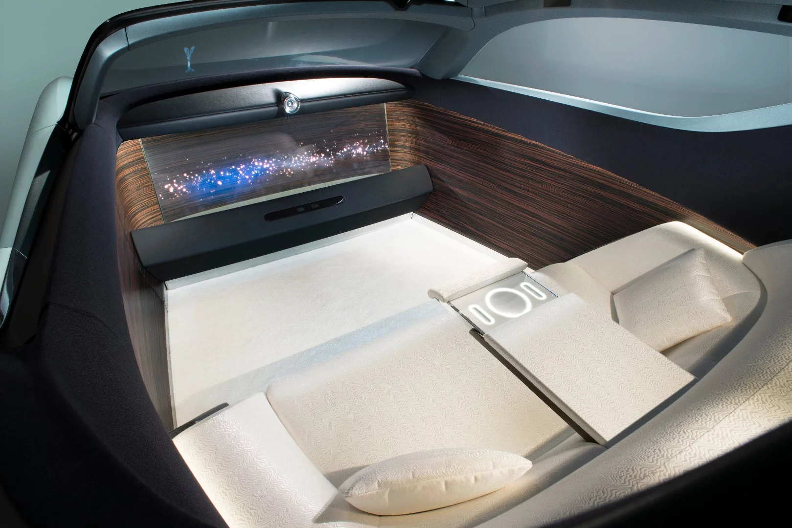 The Vision Next 100 interior is more lounge than automobile with the OLED screen providing all of the necessary information and entertainment