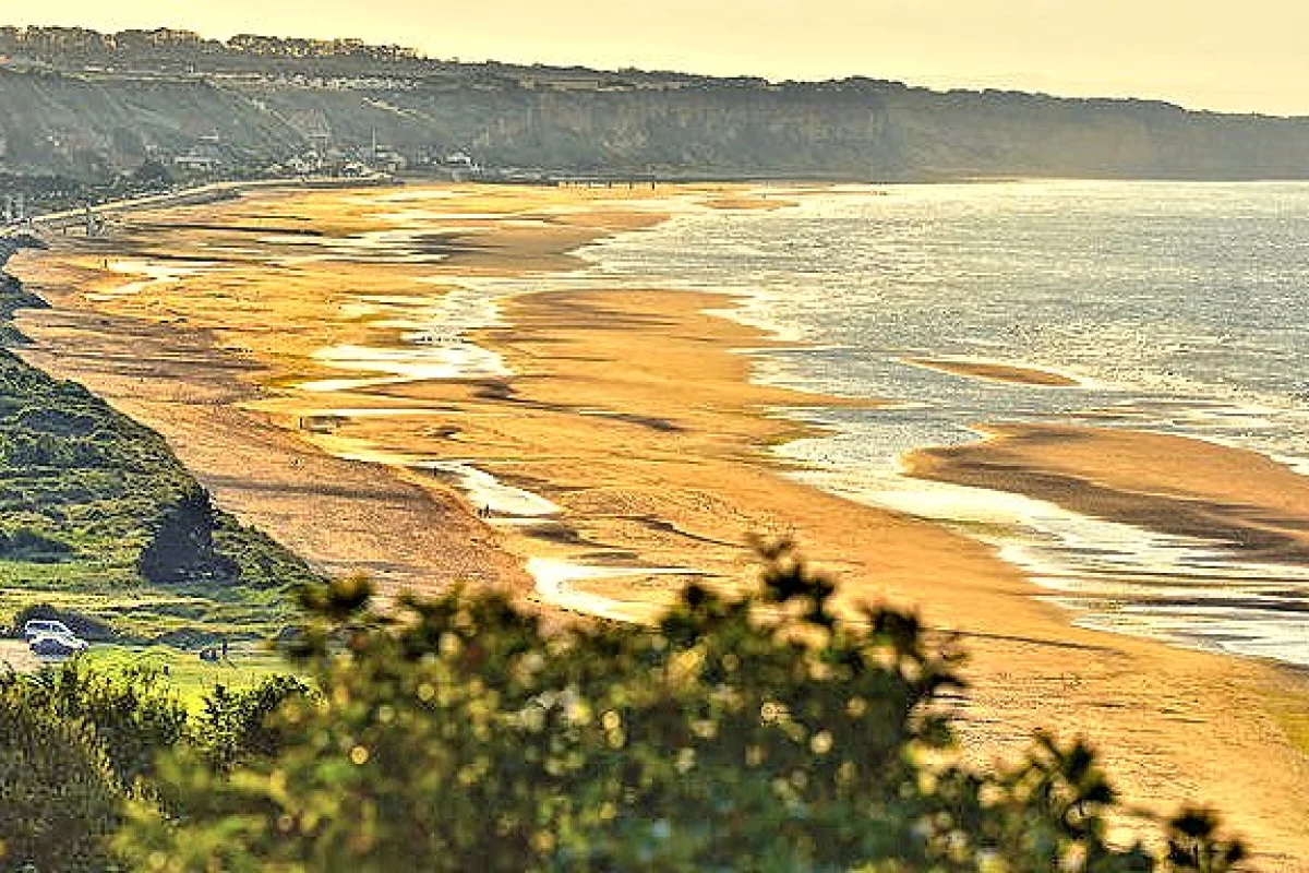 Omaha Beach in Normandy, France, as it appears today (Photo: Anton Bielousov via Wikipedia)