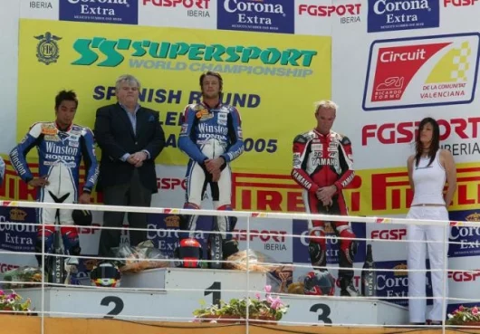 Katsuaki Fujiwara (Winston Ten Kate Honda CBR600RR) second, Ronald ten Kate (Team Manager and engine tuner extraordinairre) Sebastien Charpentier (Winston Ten Kate Honda CBR600RR) first and a whistful Kevin Curtain (Yamaha Motor Germany R6), third.