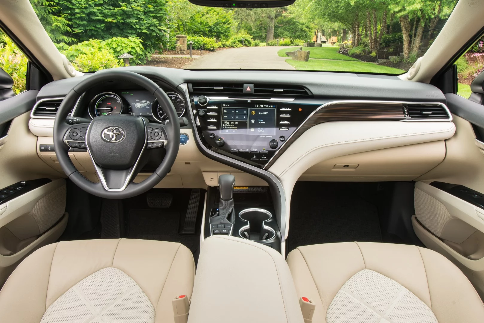 The dashboard sits a little higher, the seating feels a little more firm, and the doors feel a bit wider out than before in the 2018 Camry