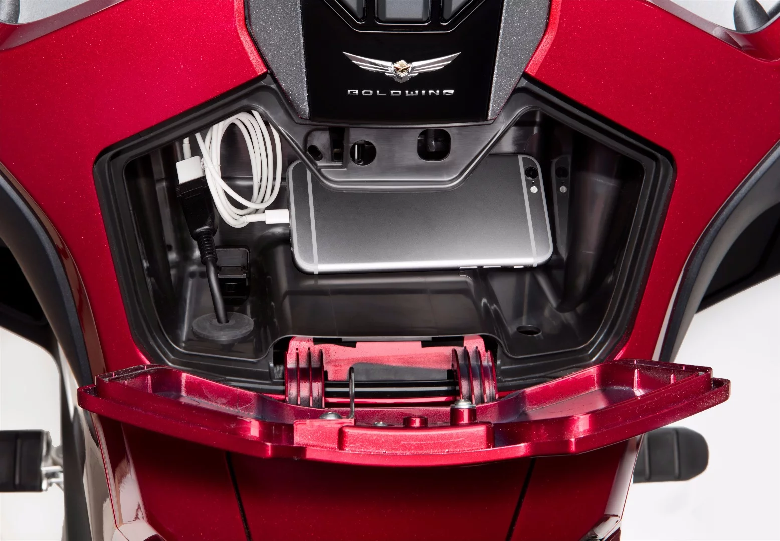 A spacious storage compartment under the handlebars of the 2018 Honda GL 1800 Goldwing