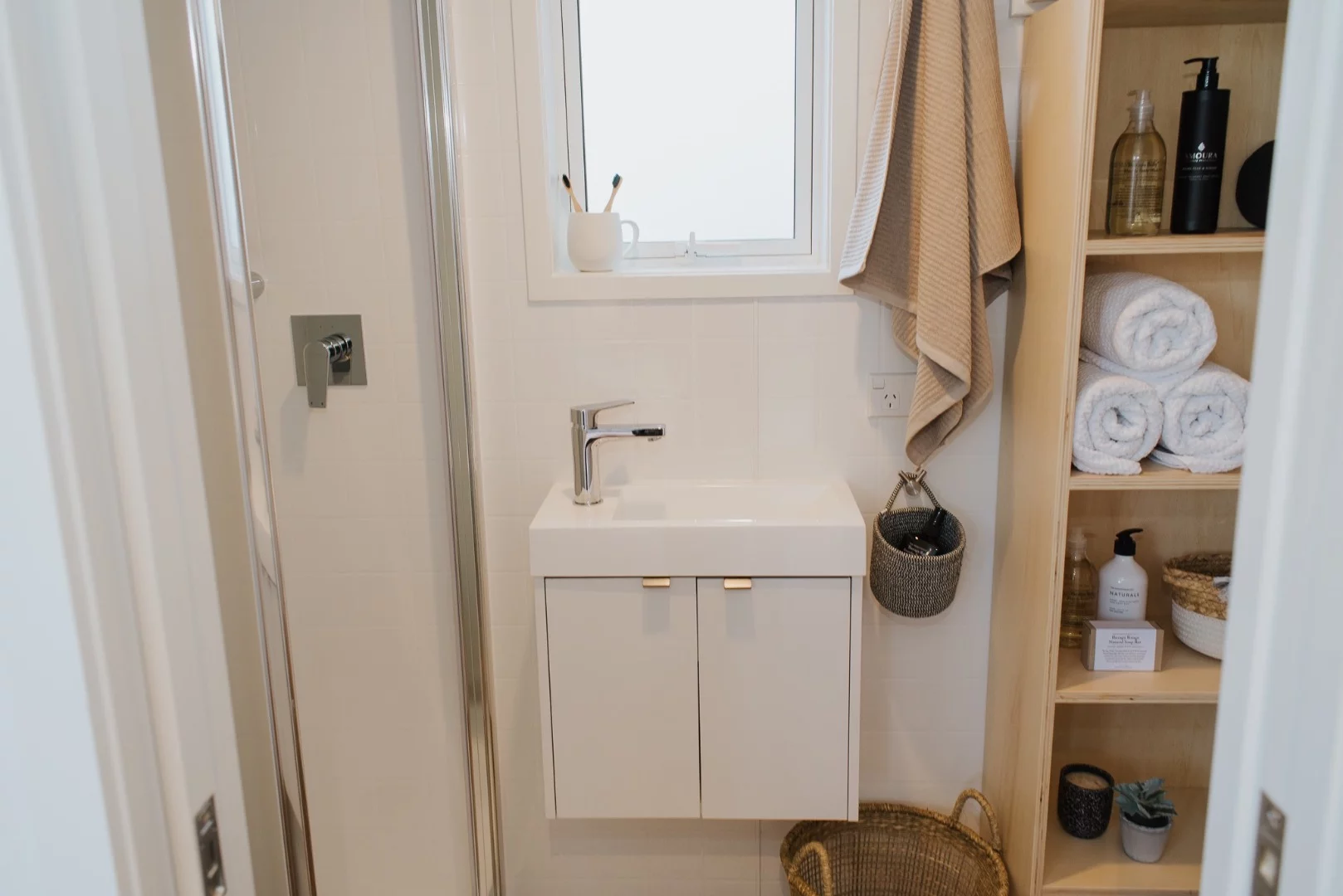 The Dance Tiny House's bathroom includes a small sink