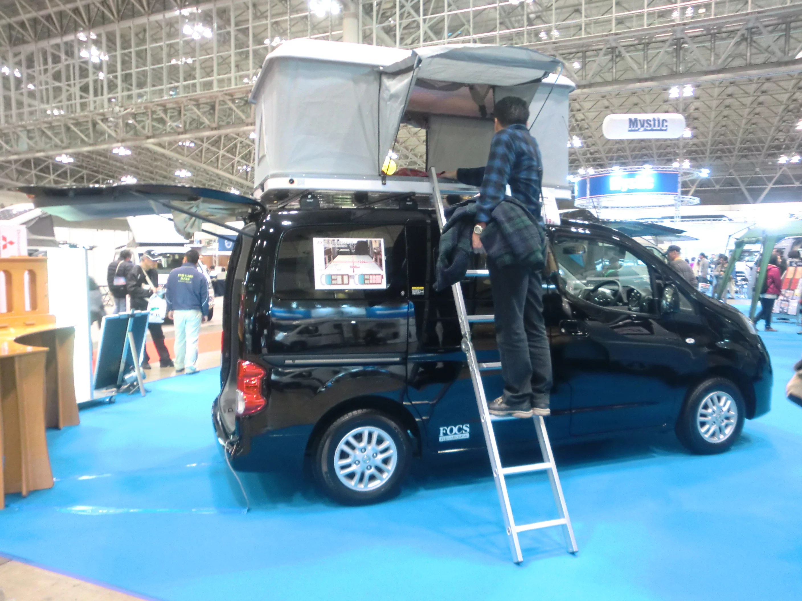 One way to increase space and also not have a dedicated living area, is to have a roof tent on top of your vehicle – this example is from FOCS (Photo: Stephen Clemenger/Gizmag.com)