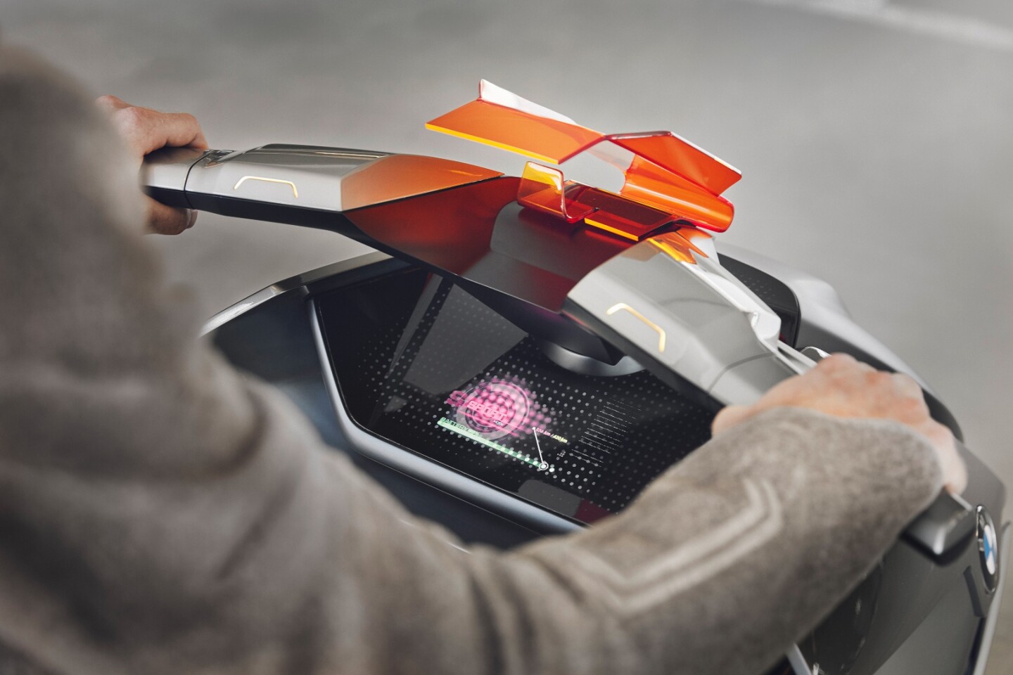 A wide touch screen below the BMW Motorrad Concept Link's handlebars displays a wealth of information