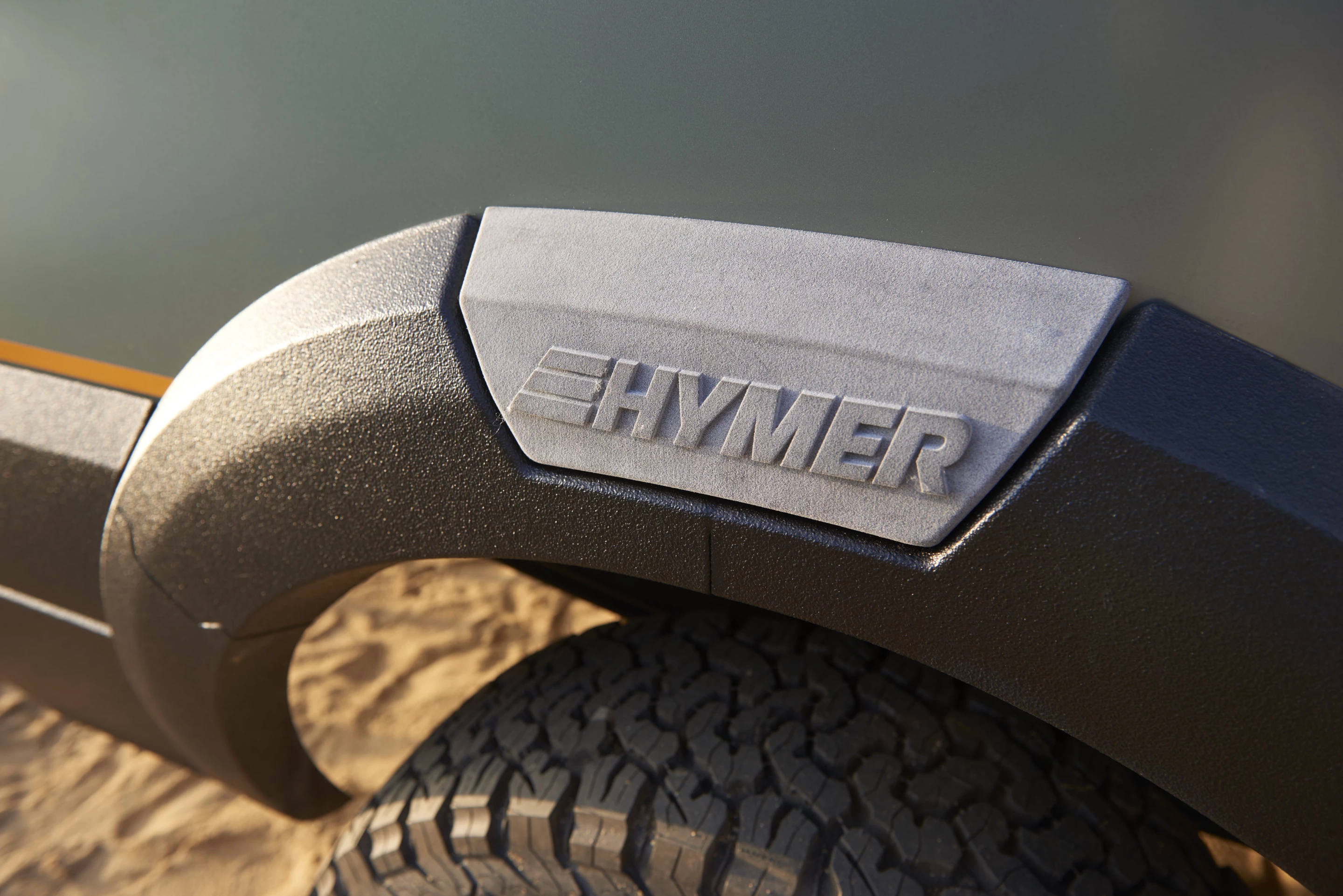 The flared fenders and other select body components are 3D printed