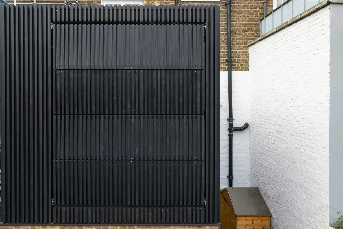 Black Box's shutters are clad in dark stained Siberian Larch