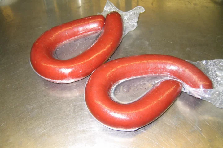 "Test sausages" used in the development of the antimicrobial film